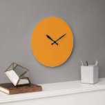 A vivid orange square surrounded by a white border large clock<br><div class="desc">Elevate your home decor with this stunning vivid orange square framed by a crisp white border. Its contemporary design is sure to catch the eye and make a statement in any room. Made with high-quality materials,  this piece is the perfect addition to your modern aesthetic.</div>