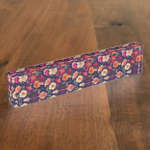 A wallpaper with a floral pattern nameplate