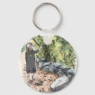 a water color illustration of a woman walking alon key ring