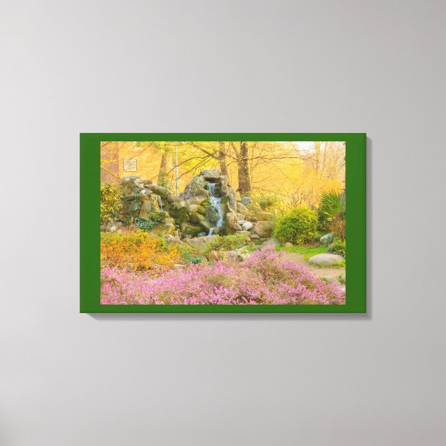 a waterfall in a flowered park on wrapped canvas (Front)
