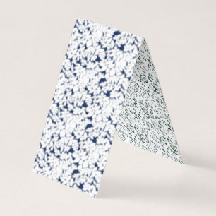 a white and blue background with a pattern business card