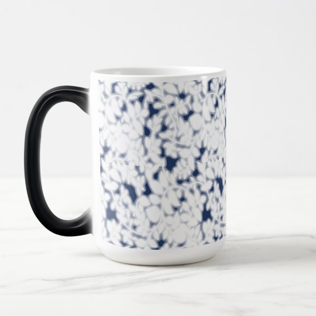 a white and blue background with a pattern magic mug (Left)