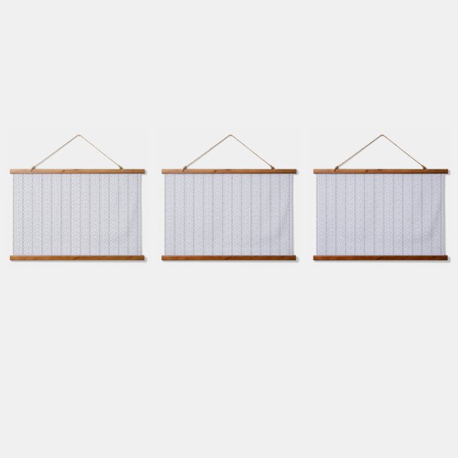 A white and grey geometric pattern fills the image hanging tapestry (Triple)