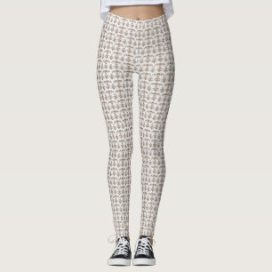 a white background with a brown pattern on it leggings