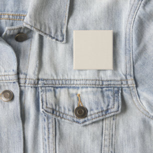 a white background with a pattern of small dots 15 cm square badge