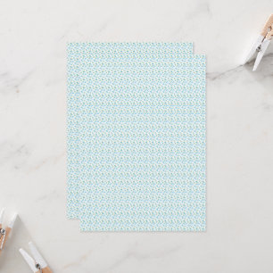 a white background with blue flowers and green lea invitation