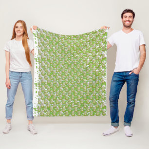 a white background with brown dots on it fleece blanket