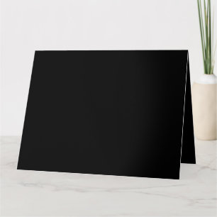 A white full moon shines brightly against a dark n card