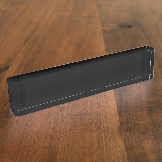 A white full moon shines brightly against a dark n nameplate (Side)