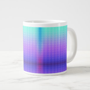 A white mug features a gradient design