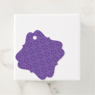 A white wrapping paper with a repeating pattern of favour tags