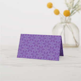 A white wrapping paper with a repeating pattern of place card
