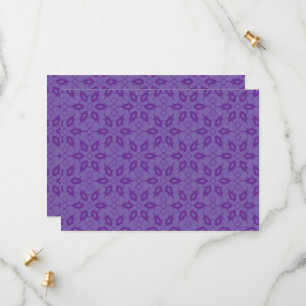 A white wrapping paper with a repeating pattern of save the date