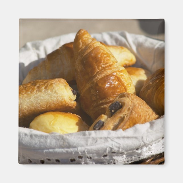 A wicker breakfast basket with croissants, and magnet (Front)