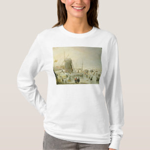 A winter scene with skaters by a windmill T-Shirt