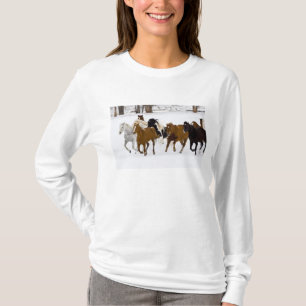A winter scenic of running horses T-Shirt
