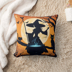 A witch brewing potions under a full moon cushion