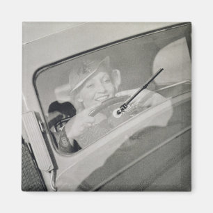 A woman driving, c.1930s (photogravure) magnet
