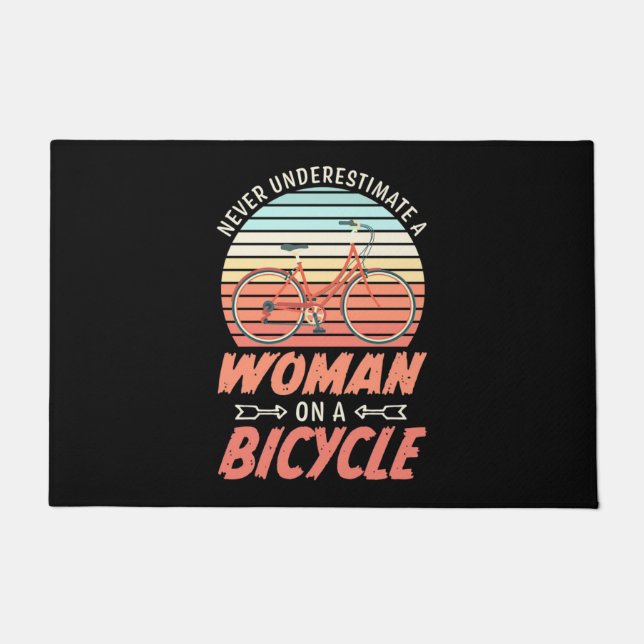 A Woman On A Bicycle Doormat (Front)