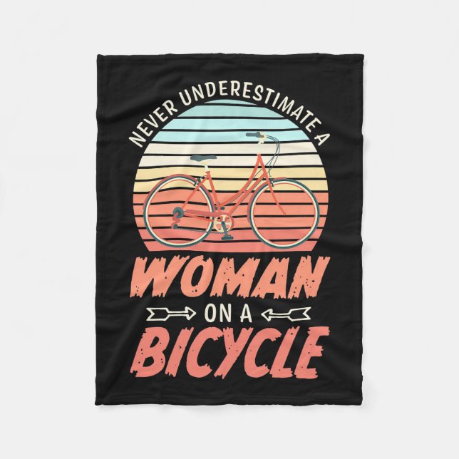 A Woman On A Bicycle Fleece Blanket (Front)
