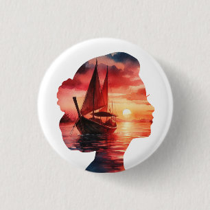 a woman's head enveloping a sunset with a sailboat 3 cm round badge