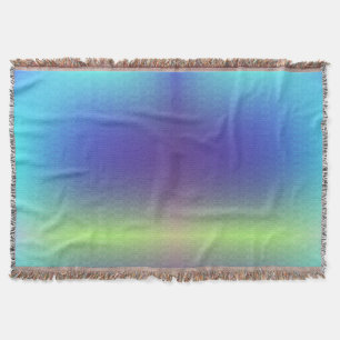 A woven colourful gradient blanket with a smooth