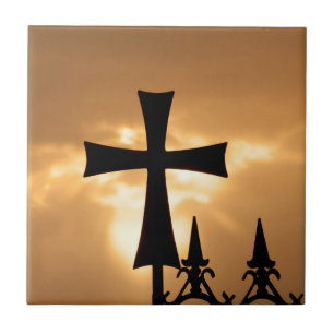 A Wrought-iron Cross on a Fence Tile