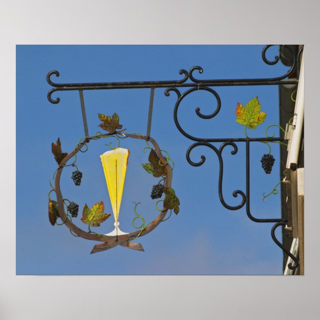 A wrought iron sign that illustrates the theme (Front)