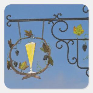 A wrought iron sign that illustrates the theme square sticker