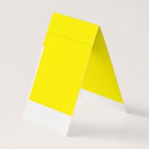 a yellow background with a black border business card