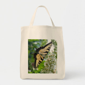 A yellow butterfly tote bag