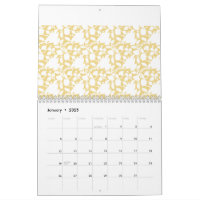 A yellow rug with a repeating motif pattern resemb