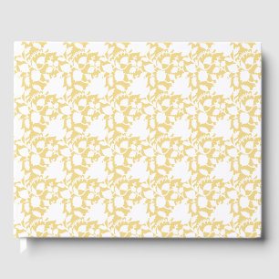 A yellow rug with a repeating motif pattern resemb guest book