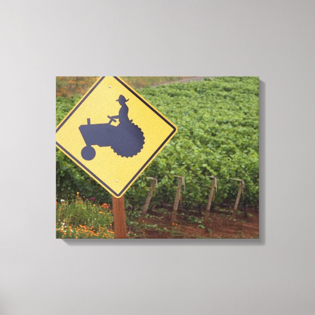 A yellow tractor crossing sign in the vineyard (Front)