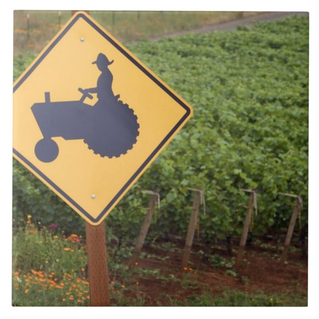 A yellow tractor crossing sign in the vineyard tile (Front)