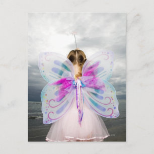 A young girl wearing a fairy costume postcard