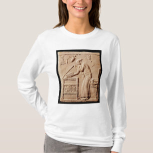 A young woman arranging her clothes in a T-Shirt