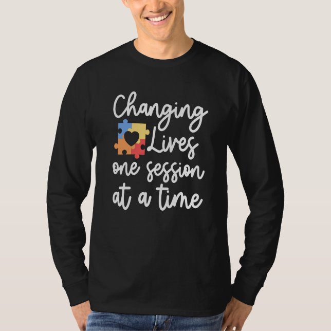 ABA Therapis Changing Lives one Session BCBA Thera T-Shirt (Front)