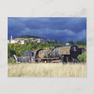 Abandoned locomotive postcard