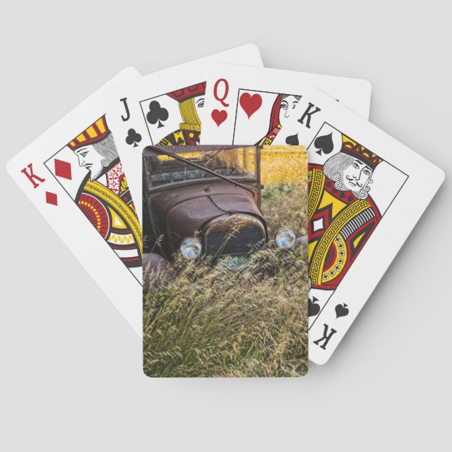 Abandoned old car in tall grass playing cards (Back)