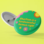 Abortion is a Fundamental Human Right Feminist 6 Cm Round Badge<br><div class="desc">Abortion is a fundamental human right written in retro yellow font on a funky hippie style button for a pro choice feminist. Show off your fun spirit with this cute green button with pretty flowers while also standing up for women's rights and the pro-choice movement.</div>