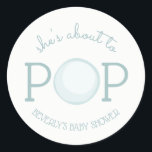 About to Pop Bubble Baby Shower Sticker<br><div class="desc">A baby shower sticker featuring text "she's about to POP" with illustration of a bubble incorporated into design.  Personalise the name.  Matching invitations and other items are available at Jill's Paperie.</div>