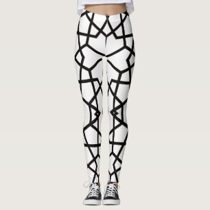 Abstract black lines pattern on pristine white leggings