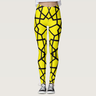 Abstract black lines pattern on pristine yellow leggings