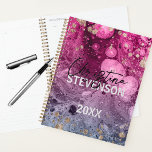 Abstract Chic Luxury Glam Marble Paint Year Planner<br><div class="desc">Discover the epitome of trendy and stylish organisation with our personalised planner design. Delve into the captivating world of paint under the microscope, where blending shades of magenta to purple lavender create a mesmerising backdrop. This aesthetic is further elevated with exquisite faux gold foil splatters, adding a touch of opulence...</div>