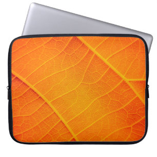Abstract closeup of an orange and yellow leaf text laptop sleeve
