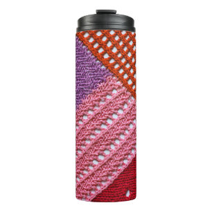 Abstract colorful texture knitted by spokes.Knitte Thermal Tumbler