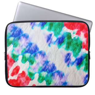 Abstract colourful tie dye pattern on a crumpled w laptop sleeve
