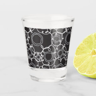 ABSTRACT FLORAL PATTERN IN BLACK SHOT GLASS