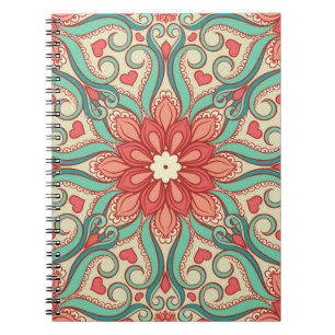 abstract floral pattern with hearts on a light gre notebook